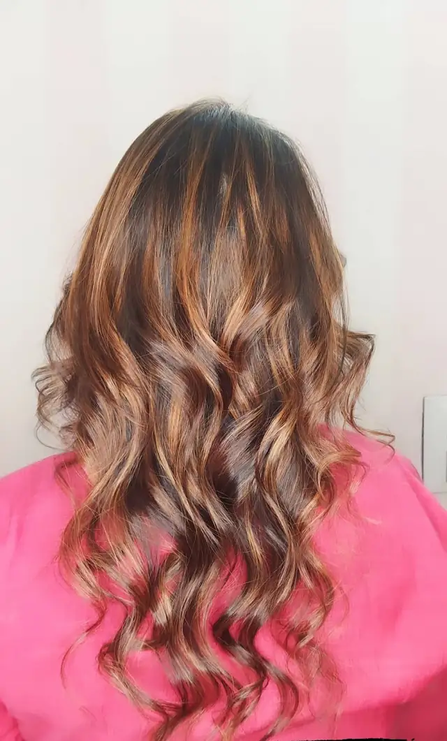 Long hair with balayage colour and curls