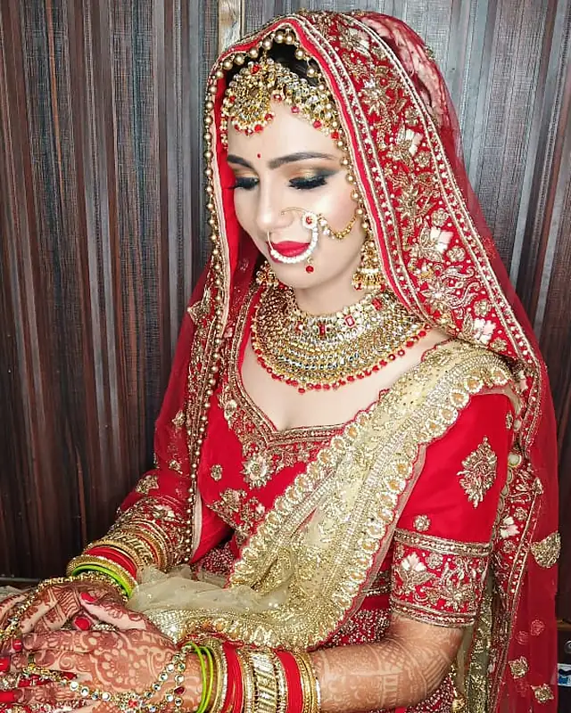 Bridal make-up, red and gold bridal set